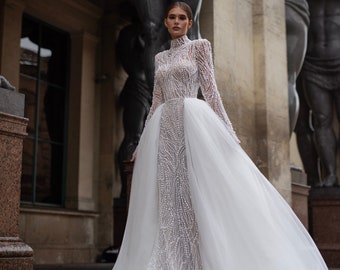 Stunning Luxurious Couture Mermaid Long Sleeve Mock neck All over Pearl Closed back Removable cathedral tulle train Wedding dress