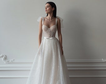 Classic Simple Light Sleeveless Brace with bow Corset Lace A-line Court train wedding dress.