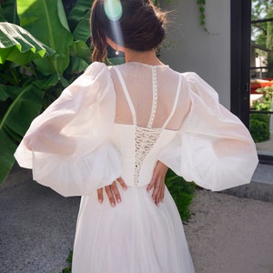 Romantic Light Long spacious puffy sleeves delicate cuffs Removable corset Lace Glitter crepe Short train A-lane wedding dress image 5