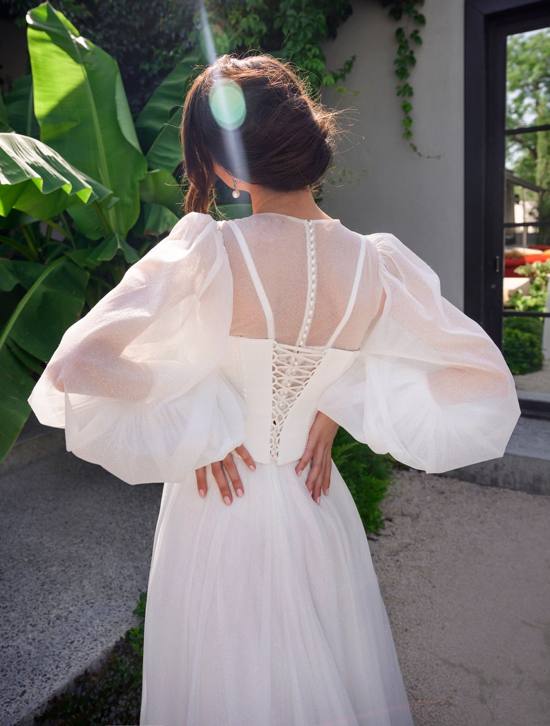 Romantic Light Long spacious puffy sleeves delicate cuffs Removable corset Lace Glitter crepe Short train A-lane wedding dress image 5