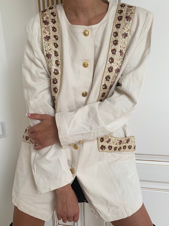 Vintage denim flower embroidered jacket.