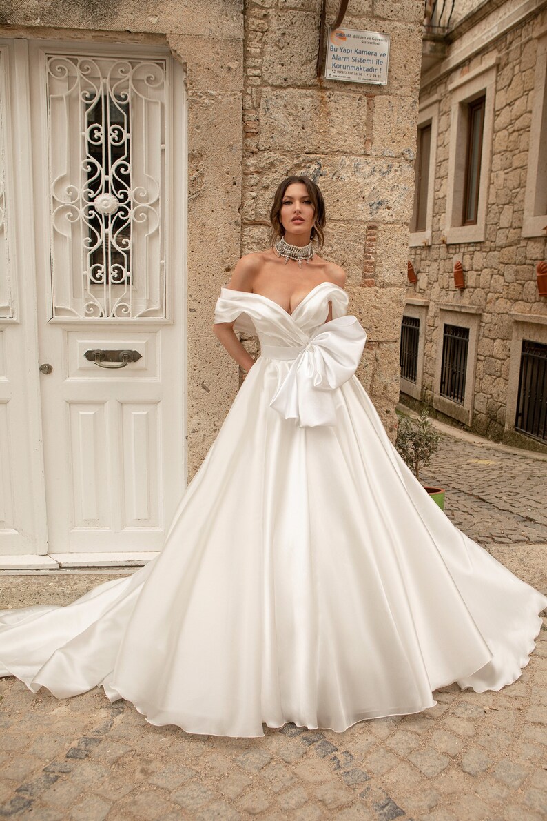 Classic Pleated off the shoulder Bow belt Lace up back A-line Chapel train Plain Satin wedding dress Bridal gown image 1