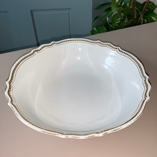 Elegant vintage white porcelain bowl with gilt edge, simple white and gold bowl