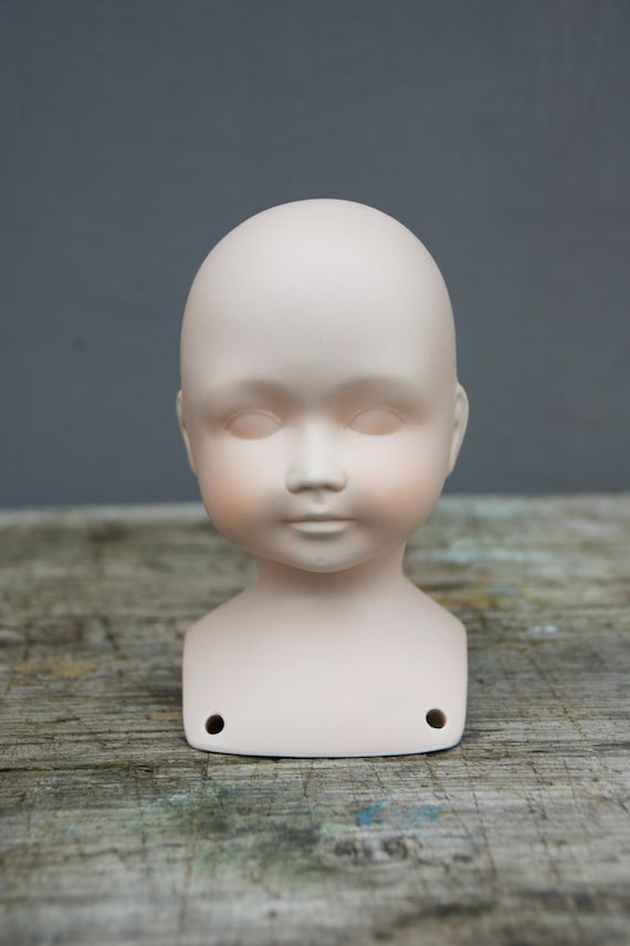 Antique doll heads hotsell