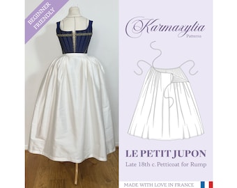 Pode incluir: Um padrão de traje histórico para uma anágua, com um corpete azul marinho e uma saia branca. A imagem inclui o texto "BEGINNER FRIENDLY" e "LE PETIT JUPON". O padrão é para uma anágua do final do século XVIII.