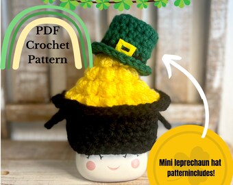 May include: A crochet pattern for a mini leprechaun hat. The hat is green with a gold buckle and is sitting on top of a pot of gold. The pattern includes instructions for making the hat and the pot of gold.