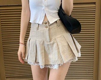 knee length pleated khaki skirt