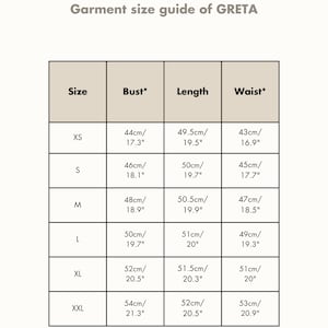 May include: A size chart for a garment labeled "Amour Linen" and "Greta". The chart lists sizes XS through XXL with corresponding bust, length, and waist measurements in inches and centimeters.