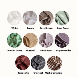 May include: A color palette of 12 fabric swatches in various colors, including white, cream, rosy brown, sage green, matcha green, mustard, dusty rose, dusty lavender, terracotta, charcoal, mocha gingham. The text "Amour Linen COLOR PALETTE" is at the top of the image. The text "Please note that colors may vary due to different monitors and browsers" is at the bottom of the image.