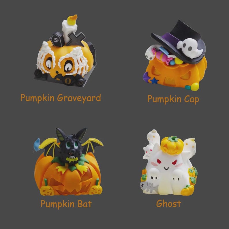 May include: Four Halloween-themed figurines: a pumpkin graveyard, a pumpkin wearing a hat, a pumpkin bat, and a ghost. Each figurine is brightly colored and features intricate details. The text "Pumpkin Graveyard", "Pumpkin Cap", "Pumpkin Bat", and "Ghost" are below each figurine.