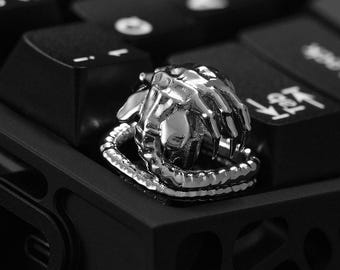 Tecla Cherry MX hecha a mano color cobre negro con diseño de Facehugger de Alien