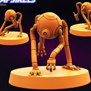 May include: A 3D printed, orange, robot model with a round head and four legs. The robot is posed in a crouching position. The model is on a round, orange base. The text "PAPSIKELS CYBERPUNK FKMSA PERRIN TRAINING DRONE - A AUGUST 2022 RELEASE" is printed on the base.