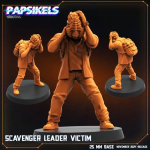 May include: A 25 mm base miniature figure of a scavenger leader victim. The figure is painted in a brown color and is wearing a jacket and pants. The figure is holding its head in its hands and has a distressed expression on its face. The figure is standing on a black base. The text "Scavenger Leader Victim" is printed on the base. The text "25 mm Base" is printed on the base. The text "November 2024 Release" is printed on the base.