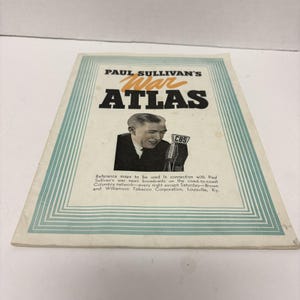 May include: A vintage "Paul Sullivan's War Atlas" booklet. The cover features a black and white image of a man with a microphone and the CBS logo. The title is in large, bold letters with a decorative border.