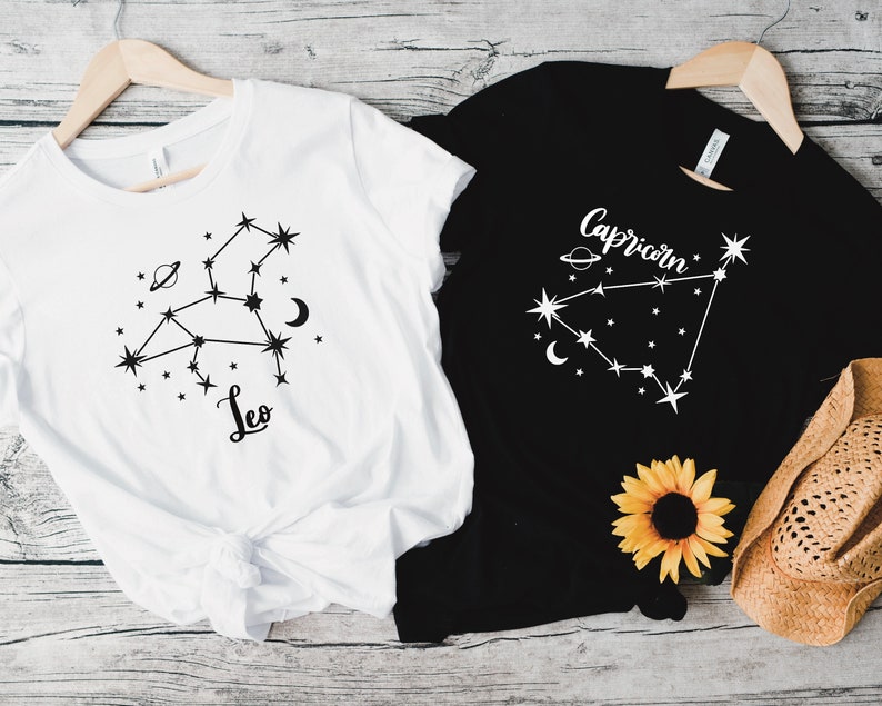 T shirt mockup featuring Leo and Capricorn constellations