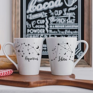 Mug mockup featuring Aquarius and Libra constellations