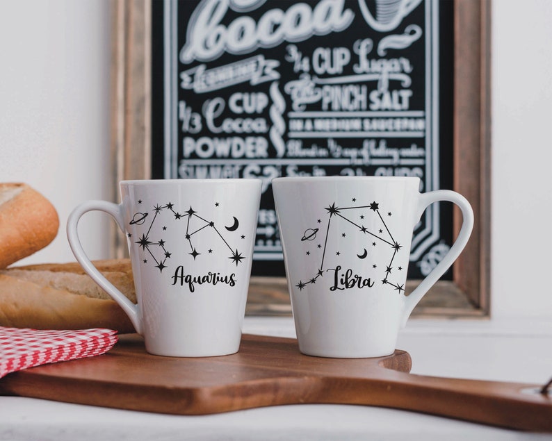 Mug mockup featuring Aquarius and Libra constellations