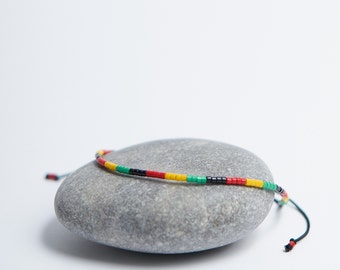 Beaded cord bracelet with Rasta colors, Colors of Jamaica, Rasta surfer bracelet, rastafarian, rasta color bead bracelet, Rasta flag jewelry