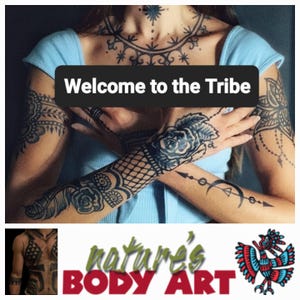 May include: A person with intricate black body art, including floral and geometric designs on the arms, chest, and shoulders. The text "Welcome to the Tribe" is displayed on a black banner. The image also includes the text "nature's BODY ART".