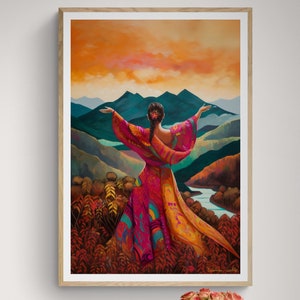 May include: A painting of a woman in a colorful dress standing with her arms outstretched, facing a mountain range with a sunset in the background.