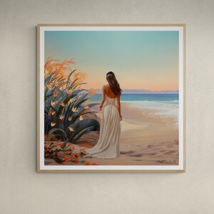 May include: A woman in a white dress walks along a sandy beach with a blue ocean in the background.  The woman is facing away from the viewer and has long brown hair.  There are orange flowers in the foreground.