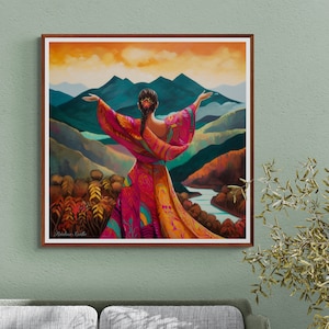 May include: A painting of a woman in a colorful patterned dress standing with her arms outstretched against a backdrop of mountains and a river. The sky is a vibrant orange and yellow.
