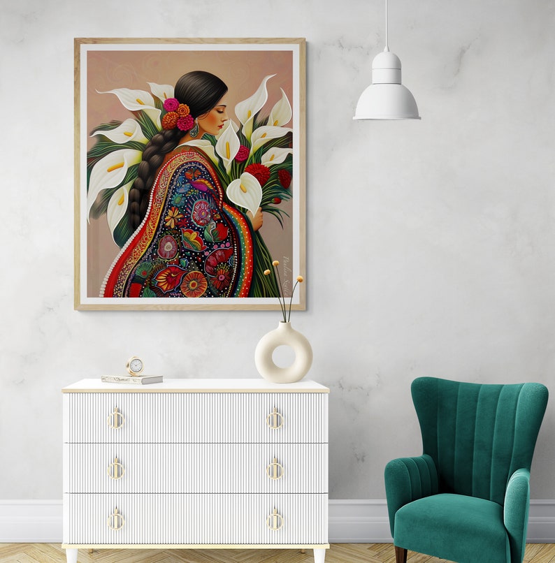 May include: A painting of a woman in a colourful embroidered dress holding a bouquet of white calla lilies.