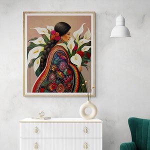 May include: A painting of a woman in a colourful embroidered dress holding a bouquet of white calla lilies. The woman has long dark hair and is wearing a floral crown. The background is a light brown.
