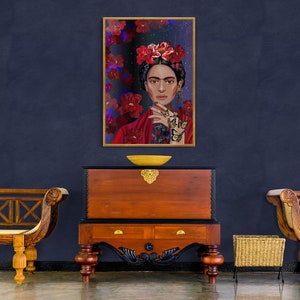 May include: A framed painting of Frida Kahlo with a floral crown and butterflies on her hands. The painting is set against a dark blue wall with two wooden benches and a wooden chest.