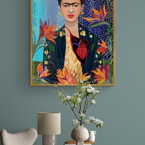 May include: A colorful painting of Frida Kahlo with a heart exposed from her chest. The background is a blue and green abstract pattern with orange flowers.