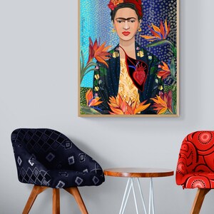 May include: A framed illustration of Frida Kahlo with a red flower crown and a heart in her chest. The background is a blue and black abstract pattern with orange flowers.