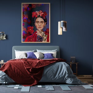May include: A bedroom interior with a blue wall, a bed with a red and blue blanket, a framed painting of a woman with flowers in her hair, and a chair in the corner.