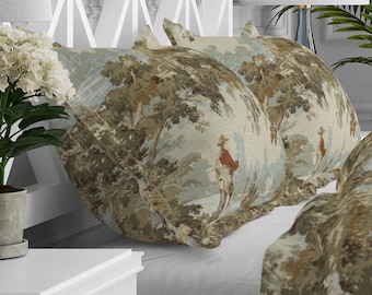 May include: Two decorative pillowcases with a woodland scene featuring trees, a river, and a person fishing. The pillowcases are a light brown color with a blue and green pattern.
