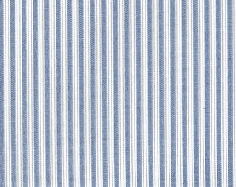 May include: A close-up of a fabric with a blue and white striped pattern. The stripes are vertical and evenly spaced, creating a classic and clean design. The fabric appears to be a woven material, possibly cotton or linen.