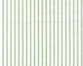 May include: White fabric with thin green stripes. The fabric has a subtle texture.