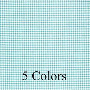 May include: A teal and white gingham fabric with the text "5 Colors" printed on it.