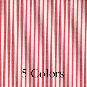 May include: Red and white striped fabric with the text "5 Colors" printed on the bottom.