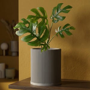 Cache-pot en béton gris avec système de drainage et plaque à eau Design Ray