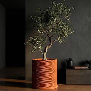 Pot de fleurs orange en terre cuite design Uma avec drainage et plaque d'eau