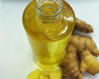 Aceite de masaje de jengibre calentador