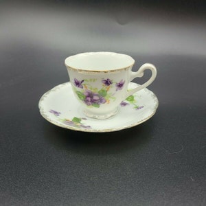 Demitasse Pedestal Teacup and Saucer Lavender Floral Set Marked EWM.