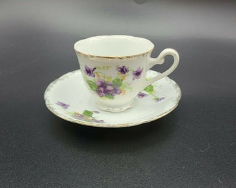 Demitasse Pedestal Teacup and Saucer Lavender Floral Set Marked EWM.