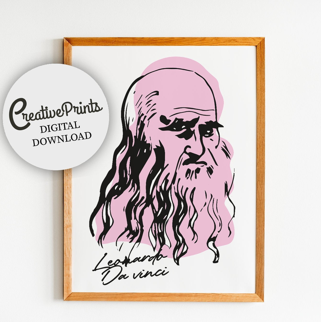 Puede incluir: Una impresión artística enmarcada con un retrato estilizado de Leonardo da Vinci sobre un fondo rosa. La ilustración en blanco y negro incluye el texto "Leonardo da Vinci" en cursiva. Un círculo blanco con el texto "Creative Prints DIGITAL DOWNLOAD" está en la esquina superior izquierda.