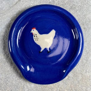 Ceramic Spoon Rest Handmade pottery with a speckled chicken design.