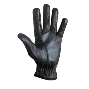 May include: Black leather driving gloves with a textured palm and a black elastic wrist band.