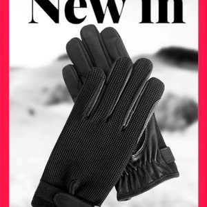 May include: A pair of black leather gloves with a textured knit back and a leather palm. The gloves have a strap with a buckle on the wrist.