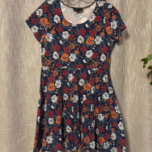 green emerald velvet dress Forever 21 Tiered Ditsy Floral Mini Dress Cream Medium at Amazon Women's  Clothing store main image 0