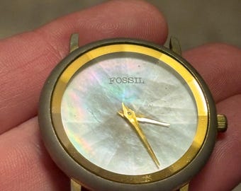 Vintage rare FOSSIL WORLD quartz watch unisex gold tone watch face only no wrist strap/band