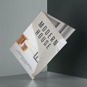K&ouml;nnte beinhalten: Eine Brosch&uuml;re mit einem modernen Hausdesign auf dem Cover. Der Text auf dem Cover lautet "MODERN HOUSE".