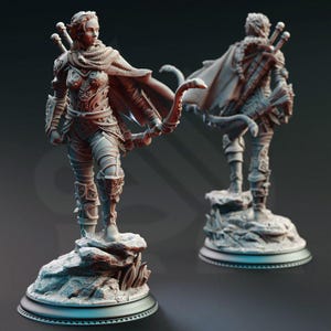 May include: A detailed figurine of a female archer, clad in ornate armour and a flowing cape. She holds a bow, standing atop a rocky base. The figure has two swords on her back. The image shows the front and back of the figurine.